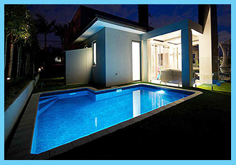 NIGHT SHOT OF WRAP-AROUND THE HOUE-POOL IN AUCKLAND
